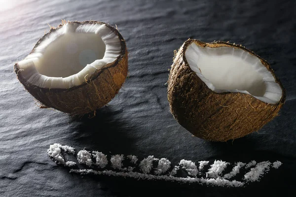 Ripe Coconut Split Two Parts Close Black Textural Background — Stock Photo, Image