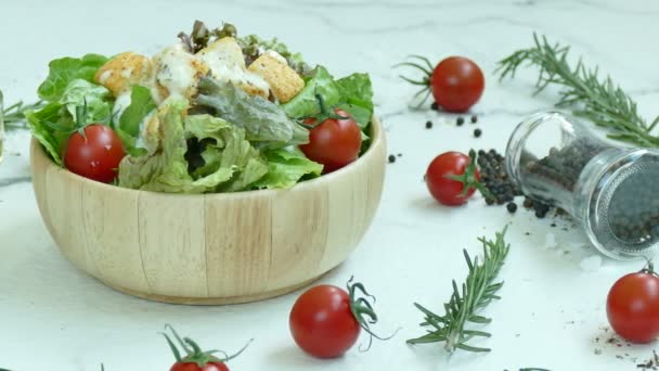 Delicious Caesar Salad Wooden Bowl Ingredients Table — Stock Video