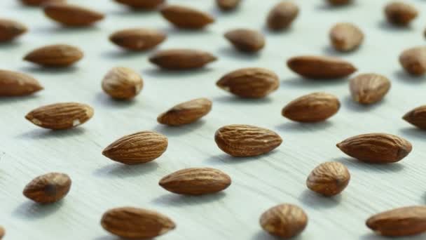 Patrón Almendras Sobre Fondo Blanco Vídeo — Vídeos de Stock