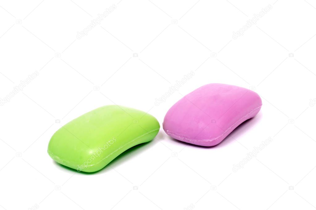 Soap in soap dish isolated on a white background. Flat lay top view