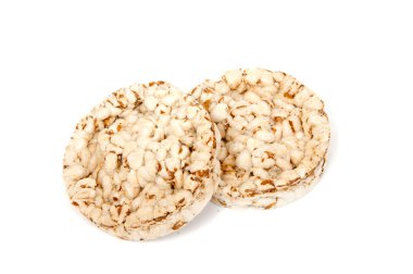 Beyaz arka plan üzerinde izole kahvaltılık pirinç ekmek.