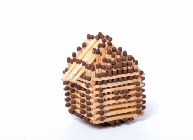 Wooden log house isolated on a white background clipart
