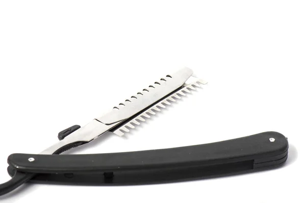 美发师工作台平板式背景 一种各种美发工具 如白色木板上的梳子 喷雾器和剪刀 — 图库照片