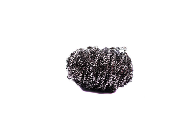 Metal brush for kitchen utensils, isolate on white. Kitchen scrubber for washing and cleaning dishes.