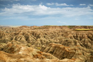 Geç öğleden sonra Güney Dakota'daki Badlands Ulusal Parkı'göster