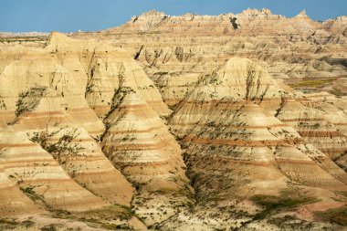 Geç öğleden sonra Güney Dakota'daki Badlands Ulusal Parkı'göster
