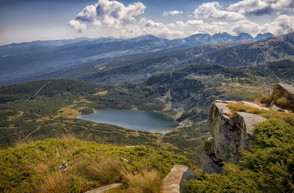 beauty scenic view from peak to a mountain lake