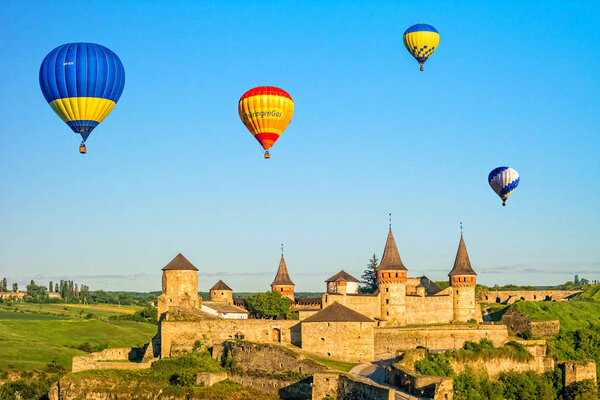 Kamyanets-Podilskyi, Ukraine - May 2017: Ancient medieval Kamianets-Podilskyi castle with balloons.