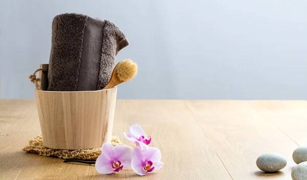 Rustic Shower Concept Towel Face Dry Brush Orchids Zen Pebbles — Stock Photo, Image