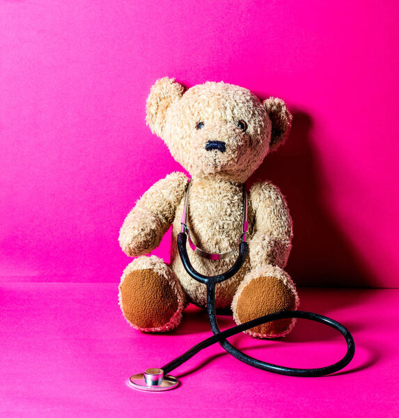 teddy bear with stethoscope for checking an injury after mishap