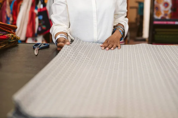 Closeup Fabric Shop Owner Standing Counter Inspecting Piece Beautiful Cloth — Stock Photo, Image