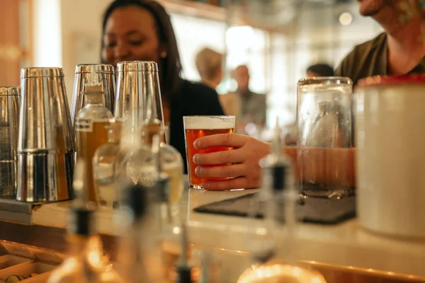 Two Diverse Young Friends Talking Having Drinks Together While Sitting — Stock Photo, Image