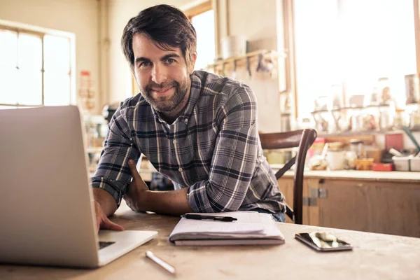 Portrait Smiling Woodworker Working Laptop While Sitting Workbench His Large — Stock Photo, Image