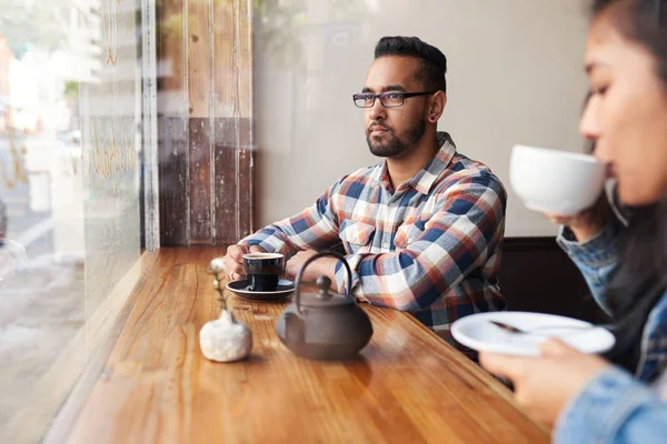 Two Young Friends Drinking Coffee Talking Together While Sitting Counter — Stock Photo, Image