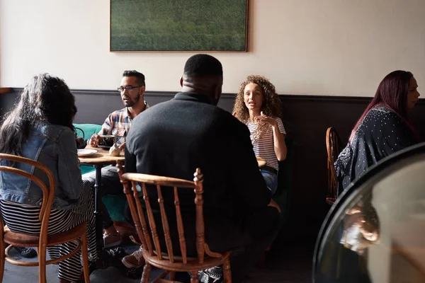 Group Diverse Young Friends Sitting Tables Trendy Cafe Drinking Coffee — Stock Photo, Image