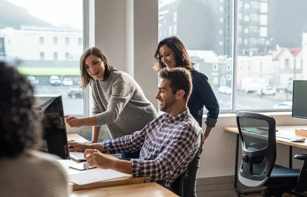 Smiling Group Diverse Young Designers Discussing Work Computer Together Desk — Stock Photo, Image