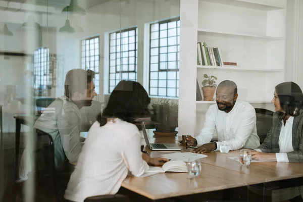 Group Diverse Businesspeople Talking Together Meeting Table Glass Office Boardroom — Stock Photo, Image