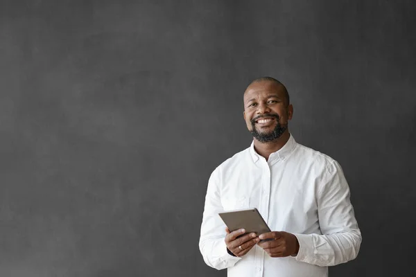Portrait Smiling Mature African American Businessman Using Digital Tablet While — Stock Photo, Image