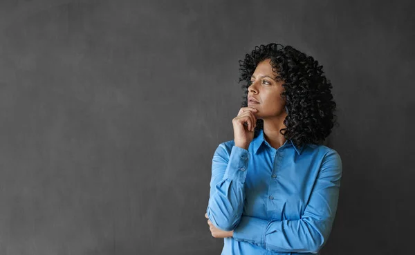 Businesswoman Looking Deep Thought While Standing Her Hand Her Chin — Stock Photo, Image