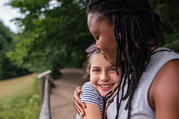 Portrait Smiling Little Girl Affectionately Hugging Her Friend While Taking — Stock Photo, Image