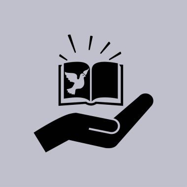 Gri arka plan üzerinde İncil kitap   