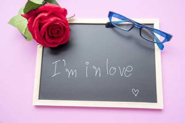 Red Rose Blue Glasses Blackboard Pink Blackboard — Stock Photo, Image