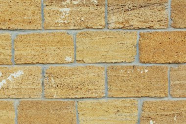 Kaba yıpranmış gözenekli kumtaşı yüzey dokusunu yakın çekim