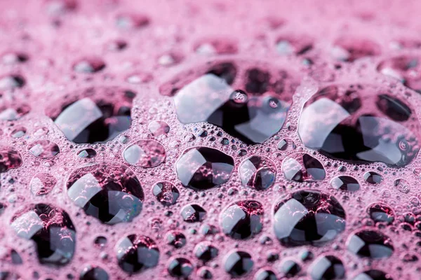 Рожевий фон мильних бульбашок — стокове фото