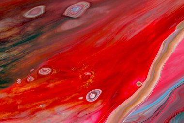 Kırmızı tonlarda akrilik boyanın soyut arkaplanı