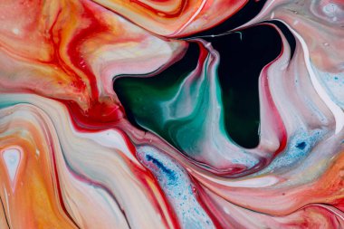 Kırmızı ve yeşil tonlarda akrilik boyanın soyut arkaplanı