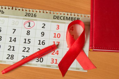 Kırmızı kurdele AIDS kopya alanı karşı farkındalığı arttırmak için takvim