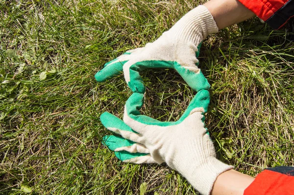 Concept Earth Day Women Hands Gloves Making Heart Shape Grass — Stock Photo, Image