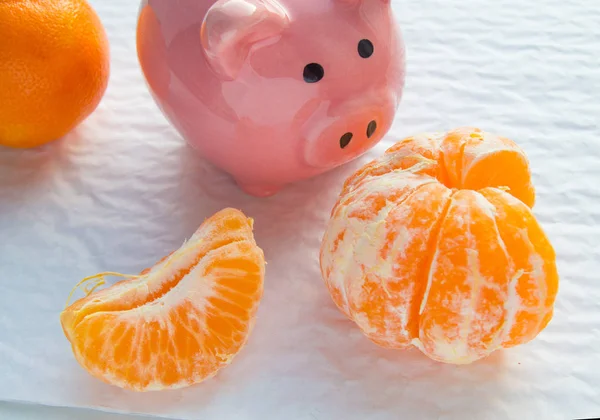 Chinese New Year Copy Space Piggy Bank Tangerines White Background — стоковое фото