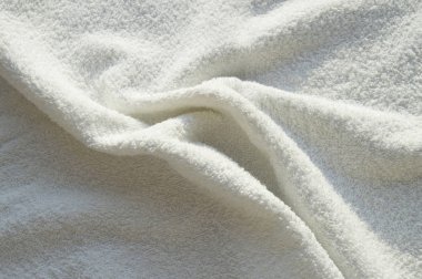 Beyaz Terry yumuşak havlu SPA tedavileri için, doku, arka plan.