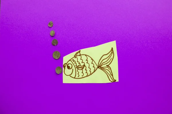 Funny fish with bubbles on purple background, fool's Day — Stock Photo, Image