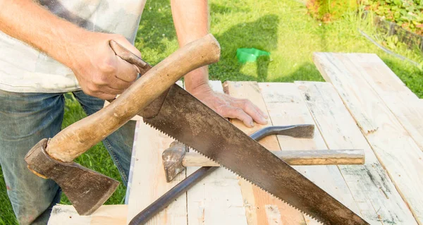 Man Uses Hacksaw Hatchet Claw Hammer Construction Work Your Garden — Stock Photo, Image