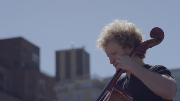 Caucasian Adult Man Playing Cello Rooftop — Stock Video