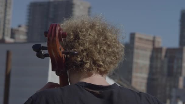 Caucasian Adult Man Playing Cello Rooftop — Stock Video