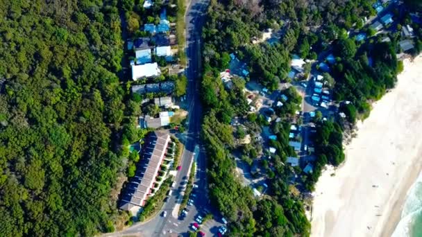 Parking in a small town. Forest. Beach. Aerial top view — Stock Video