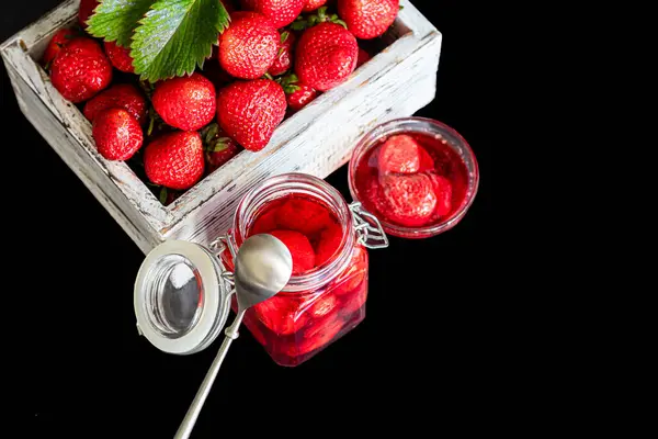 Strawberry Jam Glass Jar Next Fresh Strawberries Black Wooden Background — Stock Photo, Image