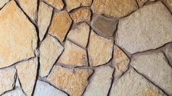 Masonry on the wall and floor. Various stone textures. Multicolored background. Shadows.