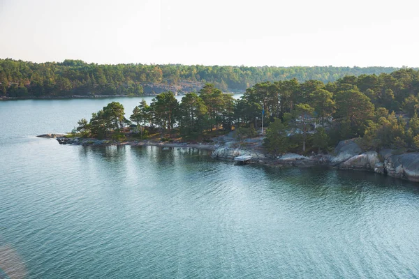 City Stocholm, Sweden. Islands, water and houses. Sunny day many trees on the island. Travel photo 2018