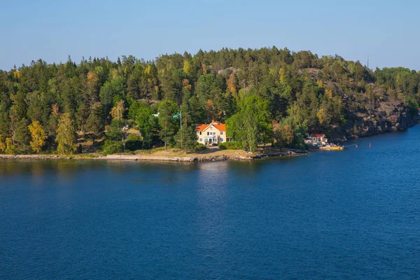 City Stocholm, Sweden. Islands, water and houses. Sunny day many trees on the island. Travel photo 2018