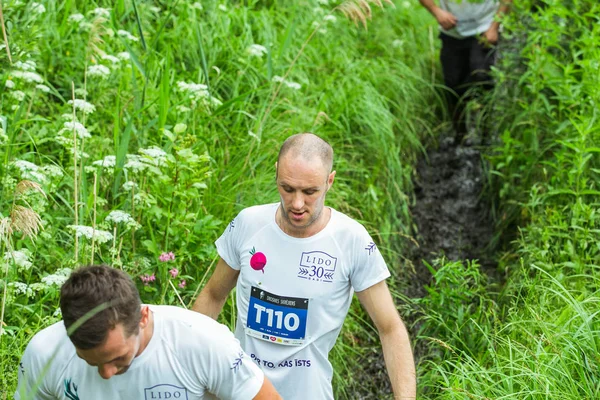 Stad Ikscile, Letse Republiek. Moed race, mensen waren bezig — Stockfoto