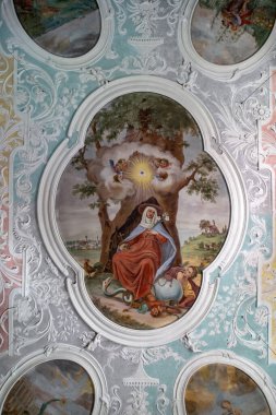 PUCH, GERMANY - 23 Mayıs 2024: Aziz Edigna Kilisesi 'nin tavan süslemesi, Aziz' in kendi resmi ile.