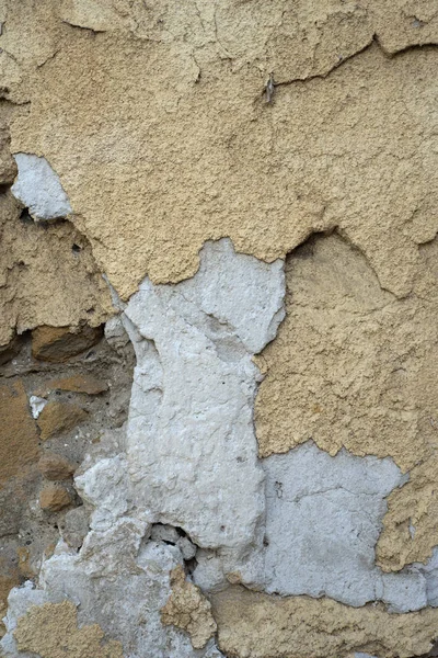 砂岩と穴と傷の古代の壁の断片 テクスチャー 昼間撮影 — ストック写真