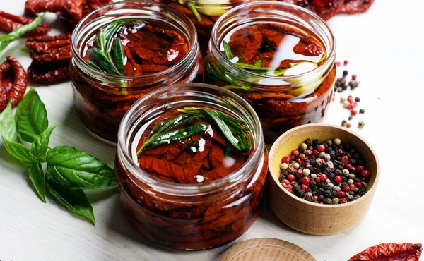 Jars Sun Dried Tomatoes White Wooden Board Close Photo — Stock Photo, Image