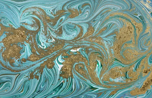 Marble pattern. Blue and green marbling background. Golden sequins.