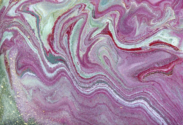 Pink and gold marbling pattern. Golden marble liquid texture.