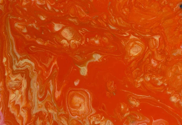 Red and gold marbling pattern. Golden marble liquid texture.